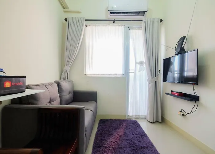Tranquil 2Br @ Green Pramuka Apartment By Travelio